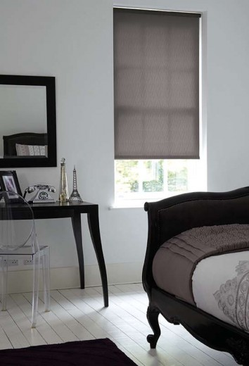 A picture of a bedroom with grey blinds Cardiff